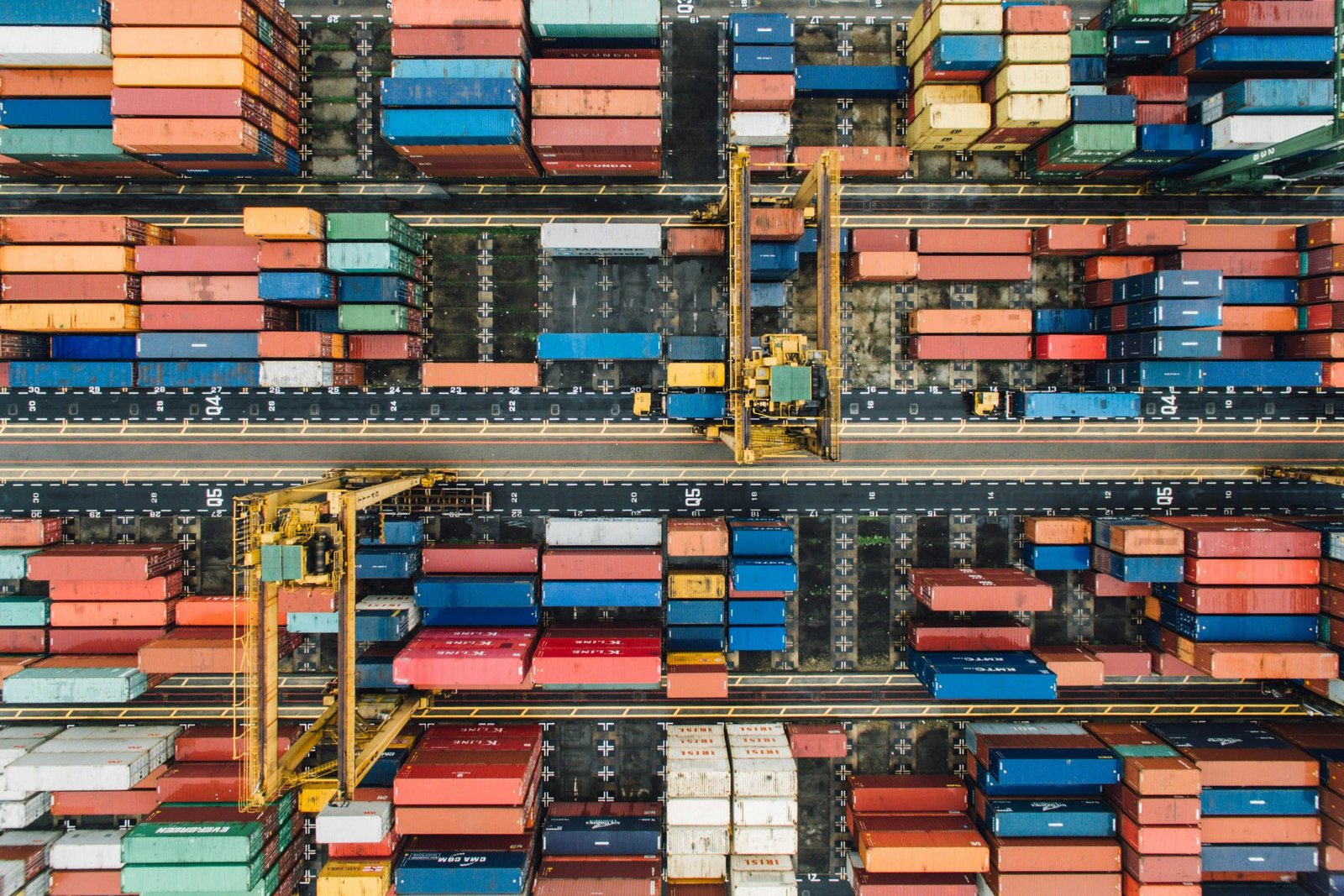 Import and Export - aerial view of shipping containers at port